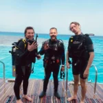Daily Diving in Hurghada with Diving Mentor: Professional PADI guides and happy certified divers exploring the Red Sea