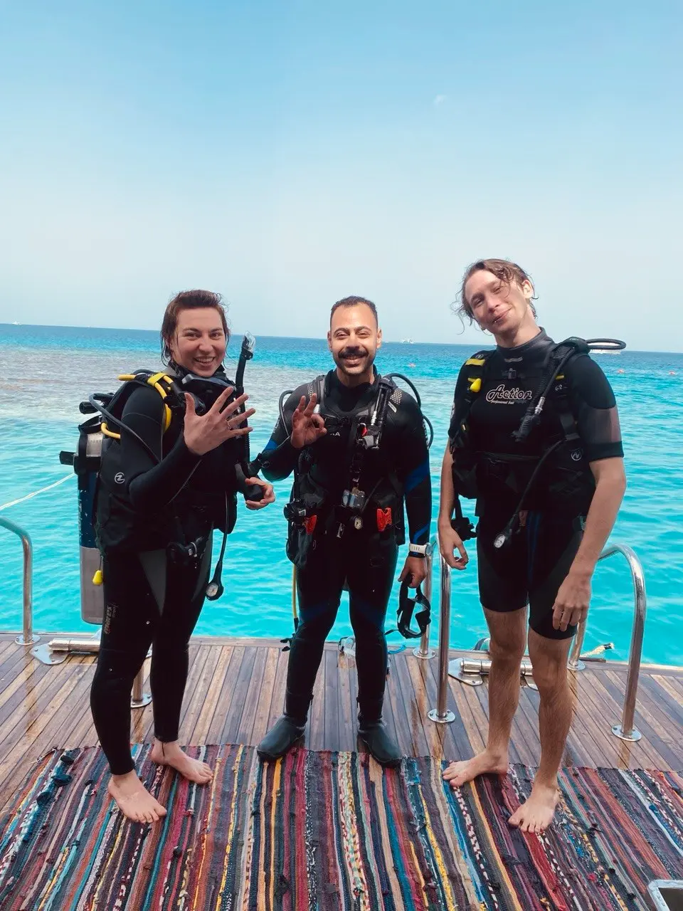Daily Diving in Hurghada with Diving Mentor: Professional PADI guides and happy certified divers exploring the Red Sea